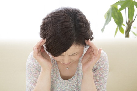 不調の女性