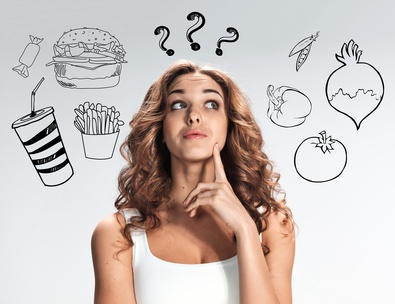 The collage of young beautiful woman with healthy and harmful meal. Detox diet and vegetarianism